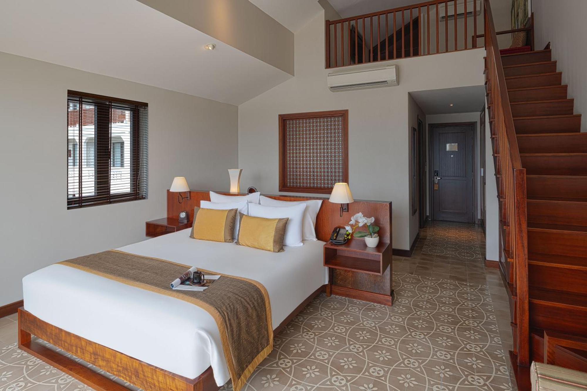 Rivertown Hoi An Resort & Spa Zewnętrze zdjęcie A bedroom at the hotel